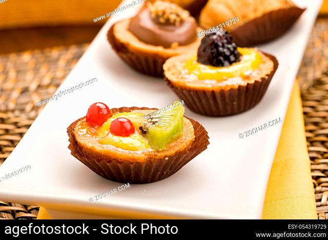 photo of different delicious pastries on the table