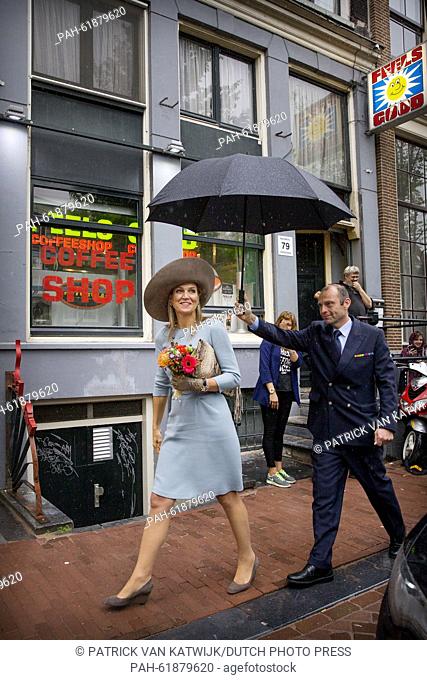 Queen Maxima of The Netherlands passing an coffee shop at the red light district at the opening of the renovated 'Ons Lieve Heer op Solder' Museum in Amsterdam