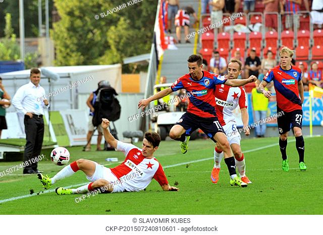 From left Robert Hruby of Slavia, Milan Petrzela of Plzen and Tomas Jablonsky of Slavia in action during the 1st round of the Czech soccer league match Viktoria...