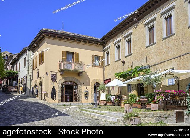 Restaurant by the clock tower, Gradara, province of Pesaro and Urbino, Italy, Europe