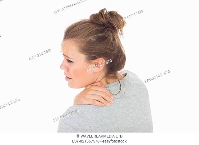 Young woman suffering from backache