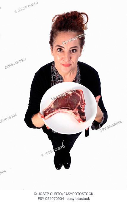 woman with steak raw on white background