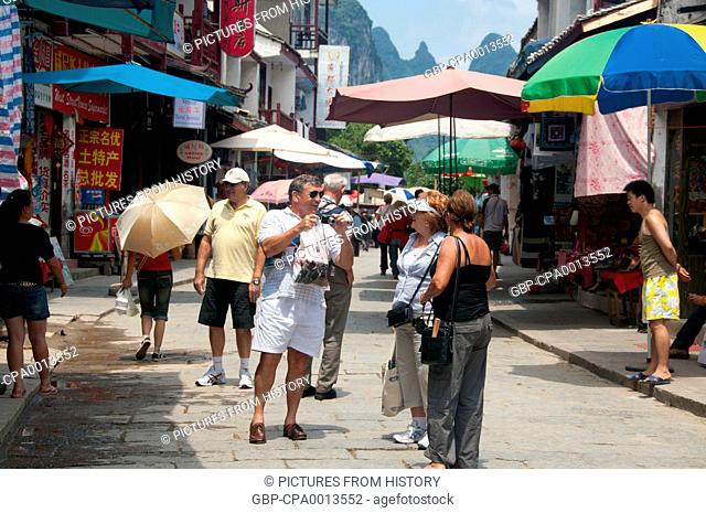 China: Tourists on Xi Jie ('Foreigner Street'), Yangshuo, near Guilin, Guangxi Province