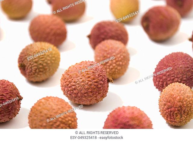 Bunch of Lychee fruits isolated on a white background