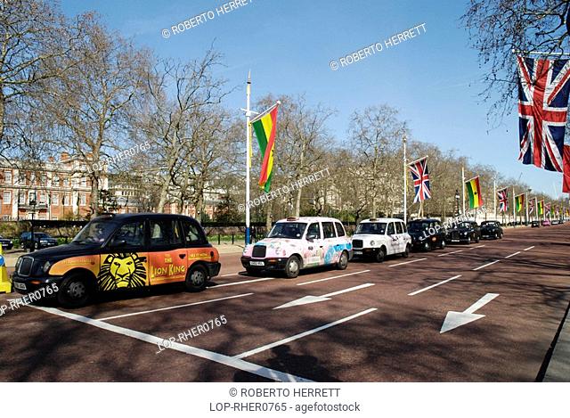 England, London, Westminster, Taxi cabs at the Mall lined with Union Jack and European Union flags