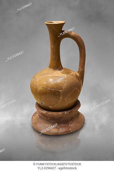 Hittite terra cotta long necked pitcher on base. Hittite Empire, Alaca Hoyuk, 1450 - 1200 BC. Alaca Hoyuk. Çorum Archaeological Museum, Corum, Turkey