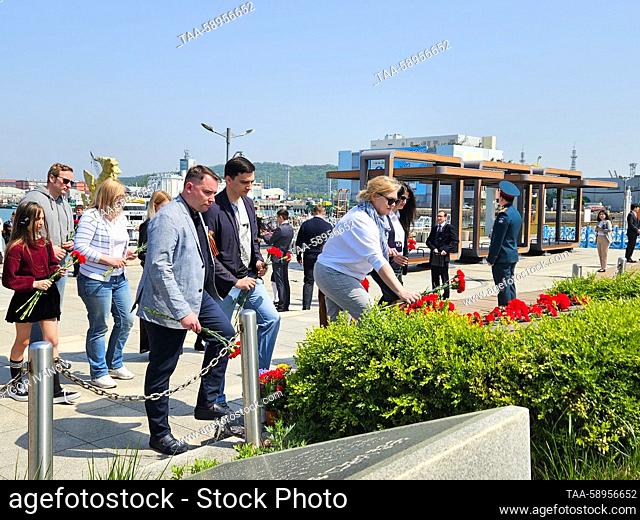 SOUTH KOREA, SEOUL - MAY 9, 2023: Russian Embassy employees attend a ceremony to lay flowers at the Varyag Cruiser Memorial on Victory Day marking 78 years...