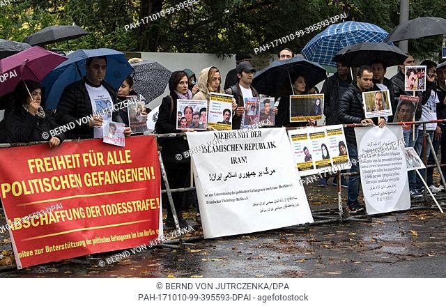 A small group of demonstrators protest against the execution of political prisoners in Iran in front of the nation's embassy in Berlin, Germany, 10 October 2017