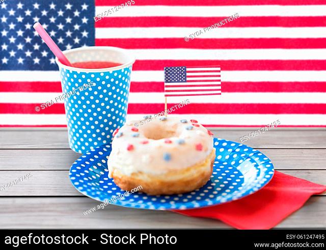 iced donut with american flag decoration and juice