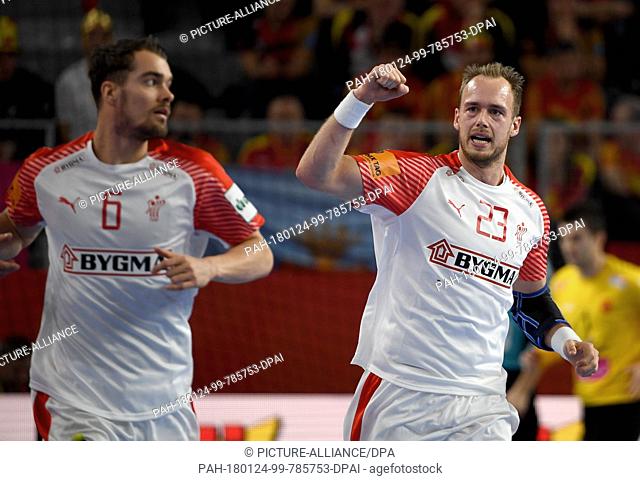Denmark's Henrik Toft Hansen (R) and Casper Mortensen celebrate after scoring a goal during the European Men's Handball Championship match between Macedonia and...