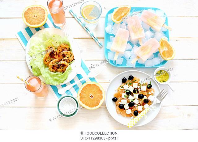 A summer buffet featuring grapefruit dishes and drinks