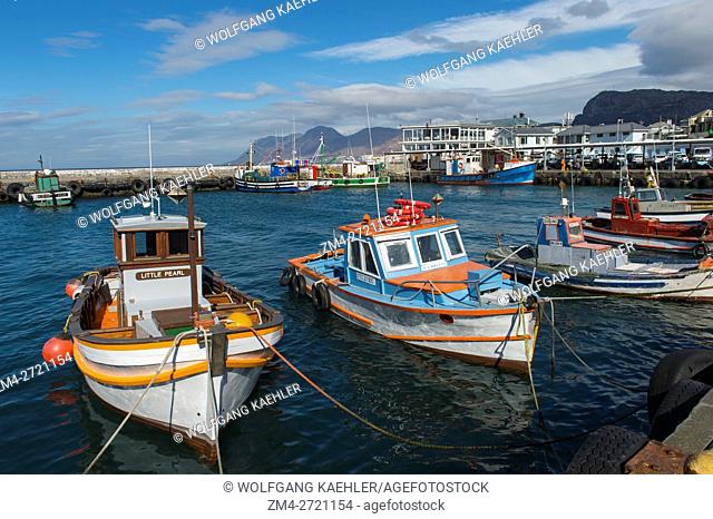 View of colorful fishing boats in the harbor of Kalk Bay near Cape Town, South Africa