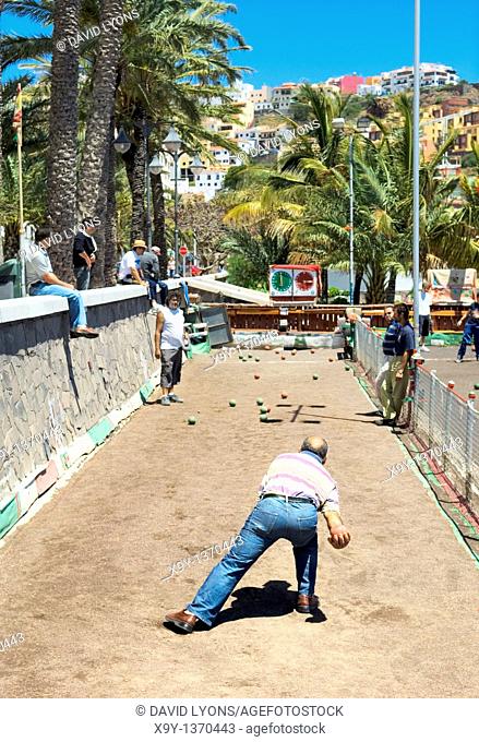 La Gomera, Canary Islands  Bowling alley on the waterfront of San Sebastian  La Gomera playing La Palma  Men playing bolas