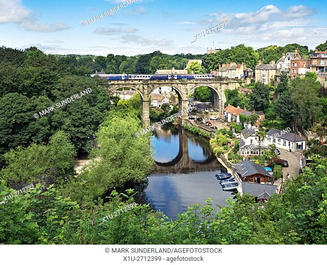 Northern Train Crossing the Railway Viaduct over the River Nidd at Knaresborough North Yorkshire England