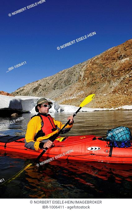 Kayaker in the Hundefjord, East-Greenland, Greenland
