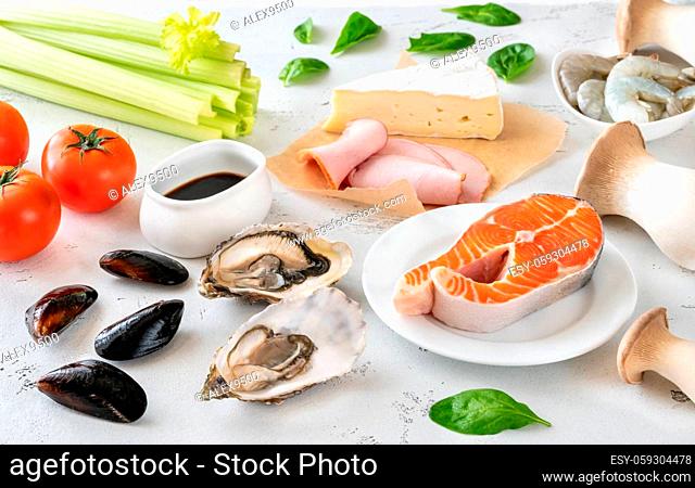 Assortment of Umami - rich foods on the white background
