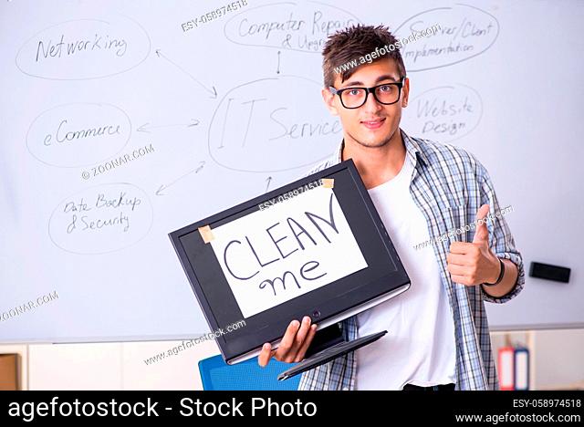Young it specialist in front of the whiteboard