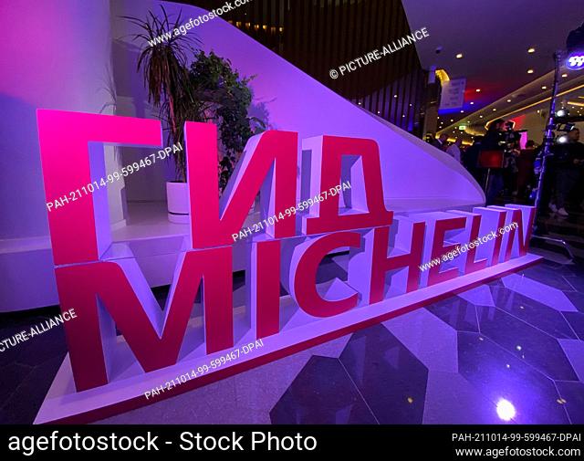 14 October 2021, Russia, Moskau: Large letters forming the text ""Guide Michelin"" are seen in front of the Michelin star award ceremony at the Sarjadje Concert...