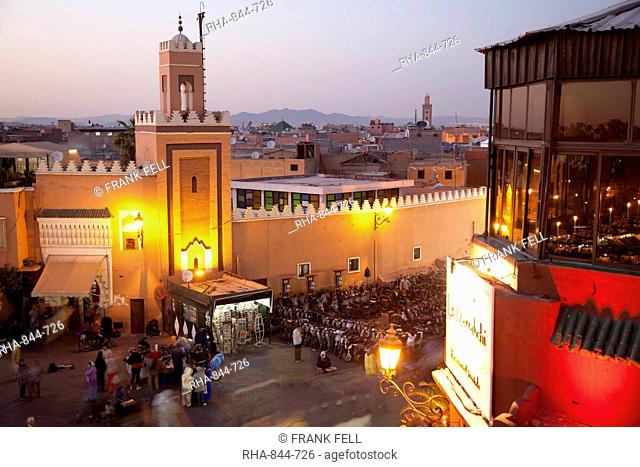 Mosque at dusk, Place Jemaa El Fna, Marrakesh, Morocco, North Africa, Africa