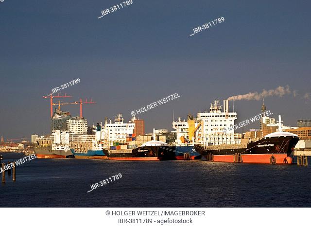 Ships in the Port of Hamburg at anchor in the North Elbe, Elbe Philharmonic Hall and the Marco Polo Tower in the back, Hamburg, Germany
