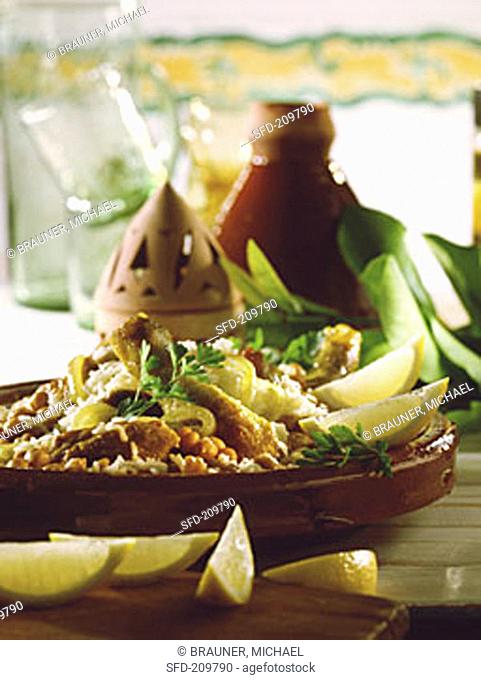 Chicken tajine with chick peas, rice and lemons