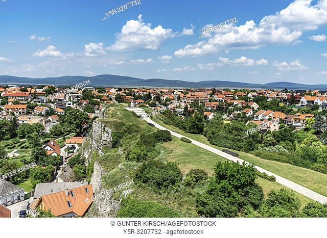 View over Veszprem to the Benedikt mountain. Since 1904 there is a cross on the mountain with a figure of Jesus, Veszprem, Central Transdanubia, Hungary, Europe