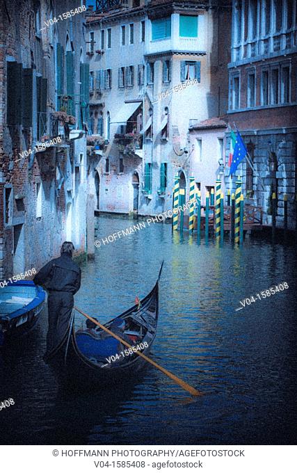 Mystical view of a gondola with gondolier in Venice, Italy, Europe