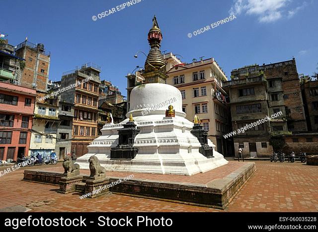 Kathmandu, Nepal - October 2021: View of a stupa in the center of a square near Durbar Square on October 4, 2021 in Kathmandu, Nepal
