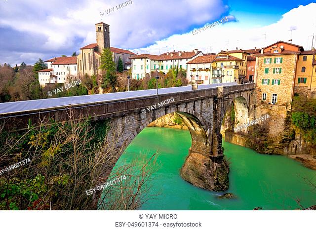 Historic italian landmarks in Cividale del Friuli, Devil's Bridge over green Natisone river, Friuli-Venezia Giulia region of Italy