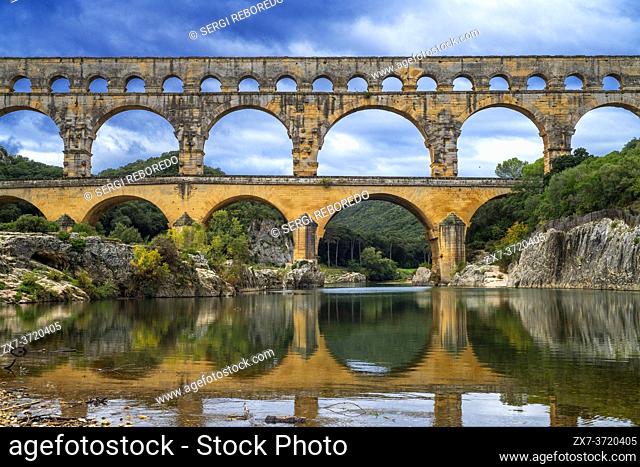 Pont du Gard, Languedoc Roussillon region, France, Unesco World Heritage Site. Roman Aqueduct crosses the River Gardon near Vers-Pon-du-Gard...