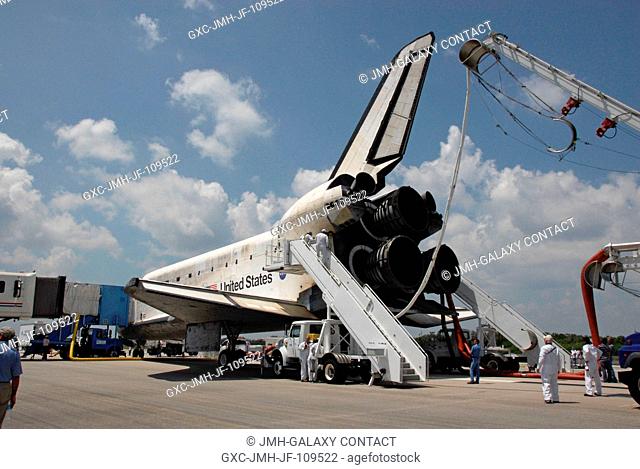 After landing on runway 15 at NASA's Kennedy Space Center, space shuttle Discovery is purged -- providing cool and humidified air conditioning to the payload...