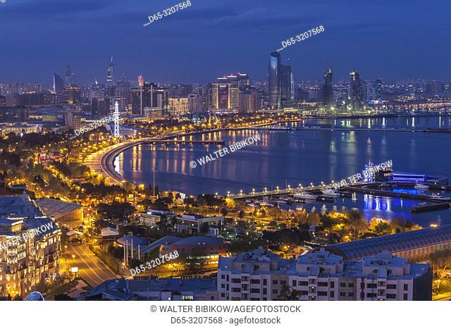 Azerbaijan, Baku, high angle view of city skyline from the west, dusk