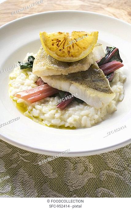 Sea bass fillets with risotto and red chard
