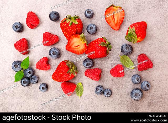 Delicious berries. Strawberries, blueberries and raspberries. Healthy summer fruits, antioxidants