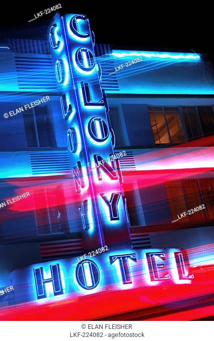The neon sign of the Colony Hotel at night, South Beach, Miami Beach, Florida, USA