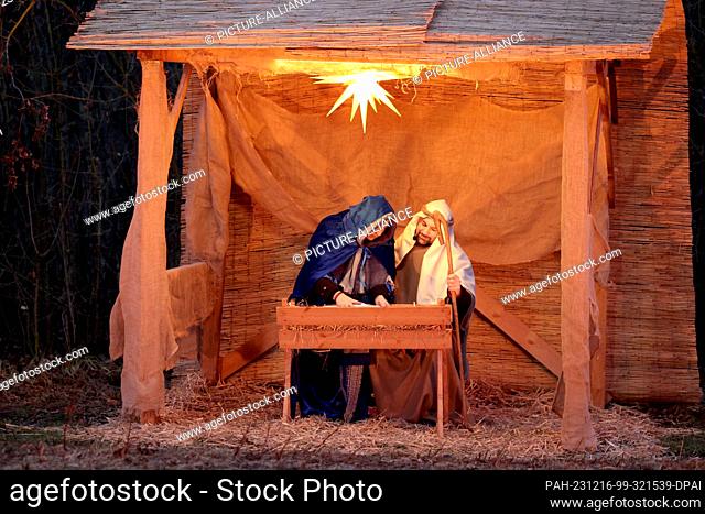 16 December 2023, Saxony-Anhalt, Beyendorf: Amateur actors re-enact the Christmas story in the Sohlen mountains. The traditional ""Beyendorf Forest Christmas""...