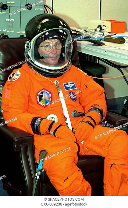 03/18/2002 -- STS-110 Mission Specialist Jerry Ross relaxes during suit fit, which is part of Terminal Countdown Demonstration Test activities