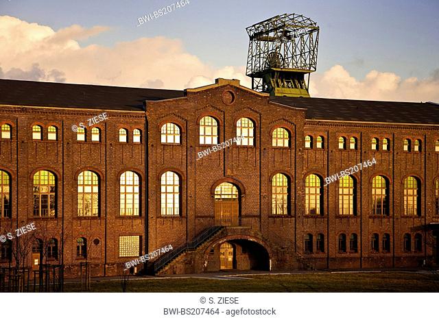 machine hall with winding tower of old coal mine Zweckel I and II, Germany, North Rhine-Westphalia, Ruhr Area, Gladbeck