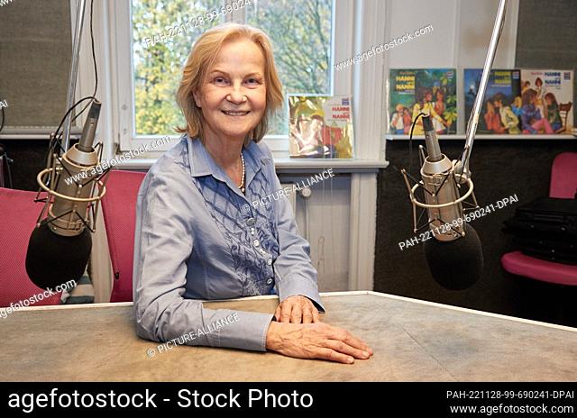 PRODUCTION - 13 November 2022, Hamburg: Heikedine Körting, producer, sits between microphones in the recording studio at Rothenbaum during a photo session for...