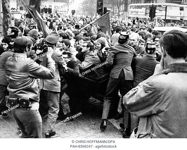 On Good Friday, 12.04.1968, police officers try to push back demonstrators on Kurfürstendamm. A wave of protest demonstrations has triggered the assassination...