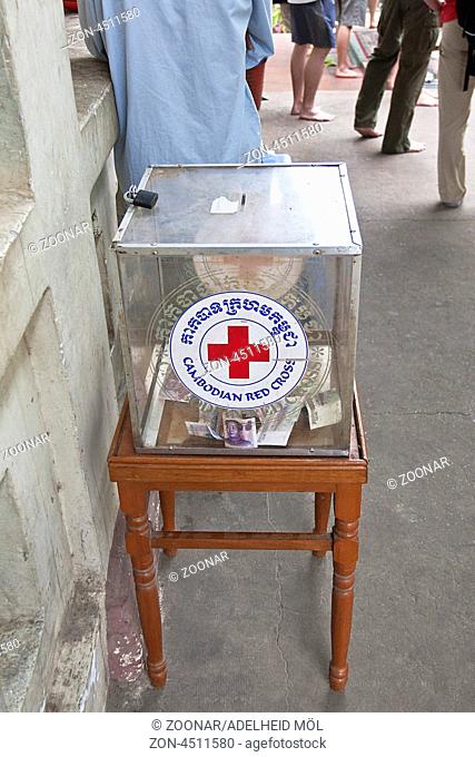 Spendenbox des Roten Kreuzes, Kambodscha, Südostasien Donation box of the Red Cross, Cambodia, Southeast Asia