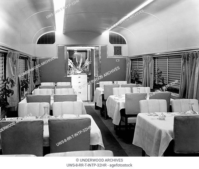 United States: c. 1938.The dining car on the Chicago, Burlington & Quincy's (CB&Q) new stainless steel, streamlined, diesel powered Denver Zephyr passenger...
