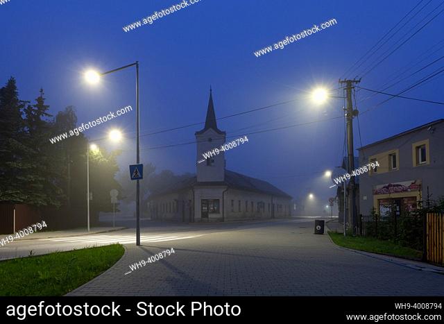 Townhall of Pribovce vilage on a foggy morning, Slovakia