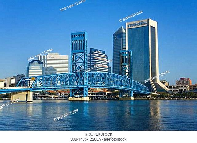 Bridge across a river with skyscrapers at the waterfront, Modis Tower, John T. Alsop Jr. Bridge, St. John's River, Jacksonville, Duval County, Florida, USA