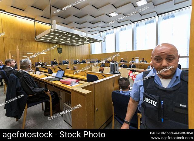 16 June 2020, Hessen, Frankfurt/Main: Stephan Ernst (l), main defendant in the Lübcke trial, sits next to his lawyer Mustafa Kaplan (front