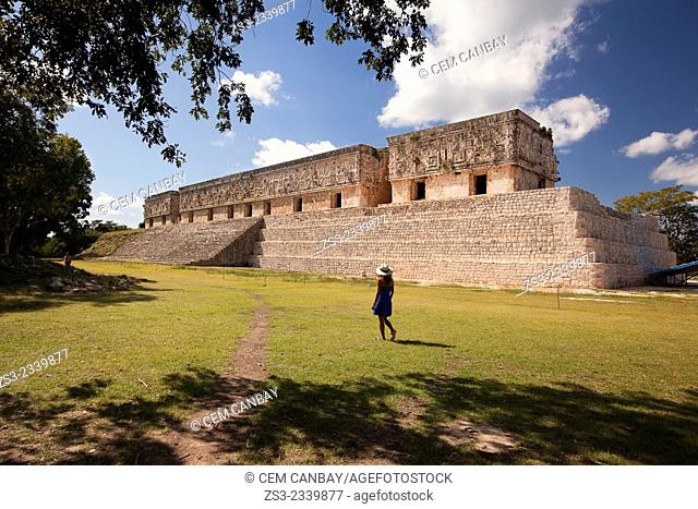 Tourists walking around the Palacio del Gobernador-Governor's Palace, Maya archeological site Uxmal, Yucatan Province, Mexico, Central America