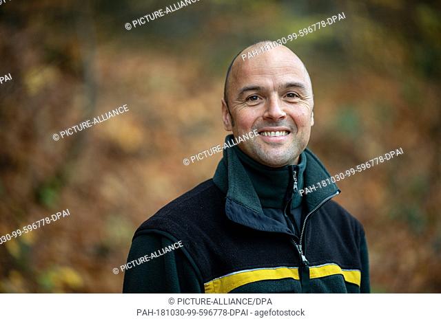 30 October 2018, Baden-Wuerttemberg, Waldenbuch: Daniel Berner, forest ranger, is standing in the woods during the presentation of measures to protect the...