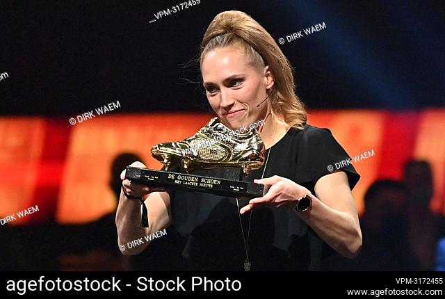 Janice Cayman, winner of the 2022 Gold Shoe award, celebrates with her trophy after the 68th edition of the 'Golden Shoe' award ceremony