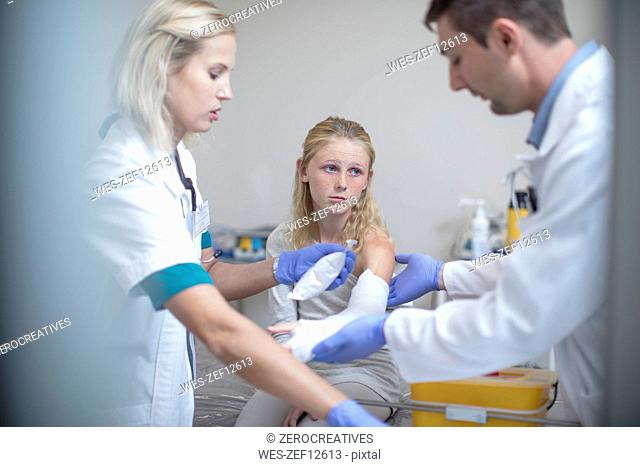 Injured girl getting treatment in hospital