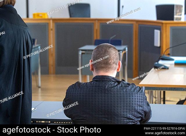 15 November 2022, Mecklenburg-Western Pomerania, Neubrandenburg: The defendant is sitting in the courtroom. The defendant is accused of manslaughter and...